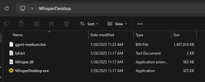 Auto-generated description: A file explorer window displays a list of files and folders within WhisperDesktop, showing details like name, date modified, type, and size.